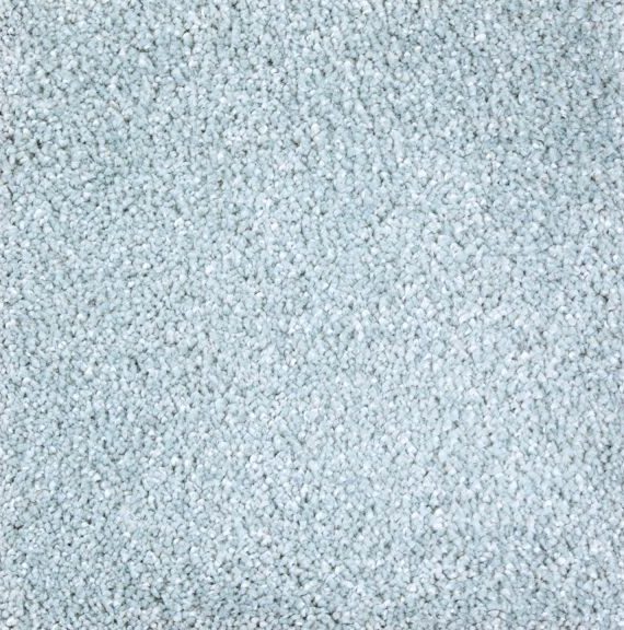 A close view of pale ice-blue cut-pile carpet, its dense flecked fibres standing straight up.